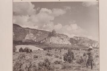 Sandstone butte on Rainbow Mesa near foot of Navajo Mountain.  Bill Belknap with the camera at right