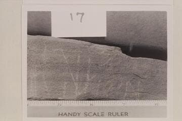 Scratches on rock slab which was taken from the Fort at the mouth of White Canyon.  It appears to say "Julian" and is on the right side