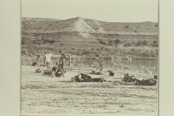 Packing up at Pierces Ferry camp before running in to Boulder City.  End of Grand Canyon traverse of 1947.  Left to right:  Al Milotte; Garth Marston; Marie Saalfrank; Zoe Desloge; Joe Desloge; Otis Marston; Randall Henderson
