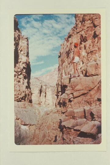 Norm Nevills posing at the mouth of Paradise Canyon