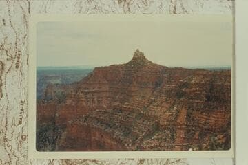 Maxson Butte northeast of Siegfried Pyre.  The Board of Geographic Names has been petitioned to give the butte the name of John H. Maxson