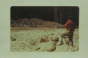 Joe Meunch photographing the "Esmeralda" entering the head of Badger Rapid