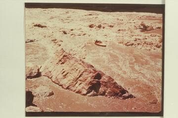 The "Susie R" at the end of the tongue at Boulder Narrows.  Print sent by Reilly.  Preliminary gauge:  122,000 cfs