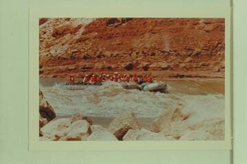 Georgie White's tribe roosting on her boloneys as they enter Soap Creek Rapid