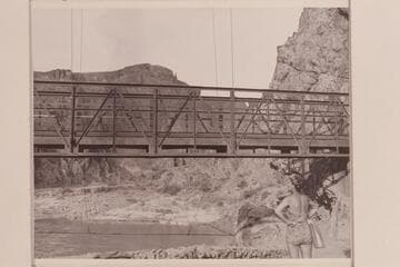 Margaret Marston at Suspension Bridge.  Nevills boats in background