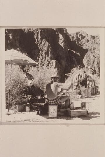 Brian checks the groceries.  Fueling operations in the background.  Beach above Bright Angel Creek