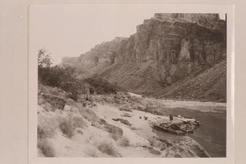 The fleet of five boats at camp at head of Hance Rapid
