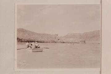Three of the four Nevills boats leaving Lees Ferry for a traverse of the Grand Canyon.  Nevills is oarsman at the right.  Frost is oarsman of the second boat.  Garth Marston is oarsman of the boat in the foreground