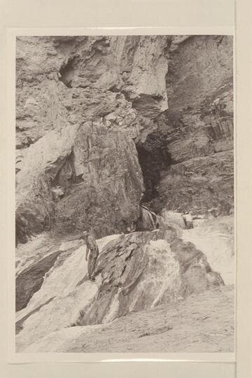 Mouth of Travertine Canyon.  Hugh Cutler tries to find a way down.  Chuck Richey tries to find a way up