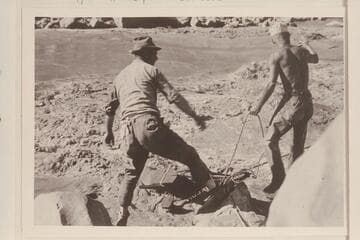 Burchard and Dodge at wreck of the "Mojave" at Cave Springs Rapid- Mile 25.5