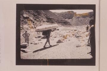 Bill Belknap portages Sportyak at Soap Creek Rapid
