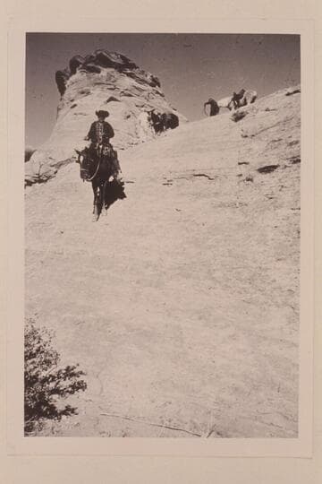 Dan Lehi riding down from the divide between Bald Rock and Nasja Creeks near the San Juan River