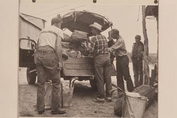 Loading the Power Wagon to run out to the edge of Rainbow Plateau to meet the stock- Ralph Cameron, Bill Belknap, Jorgen Visbak and Bahe;  Navajo Mountain Trading Post