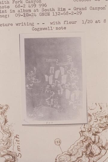 The footprint section of the panel of inscriptions below the mouth of Smith Fork Canyon