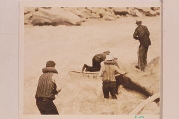 The Dusty Dozen lining the "Lota-Ve" at 21 Mile Rapid