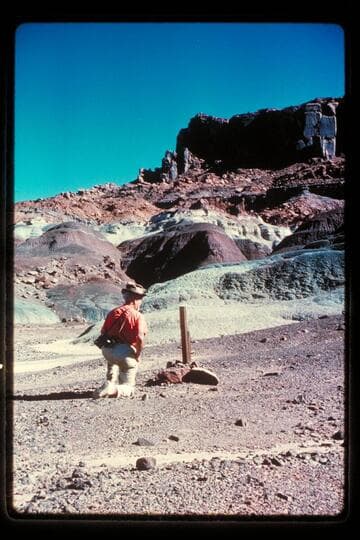 Dock Marston examines claim marker, upper Rincon Bar