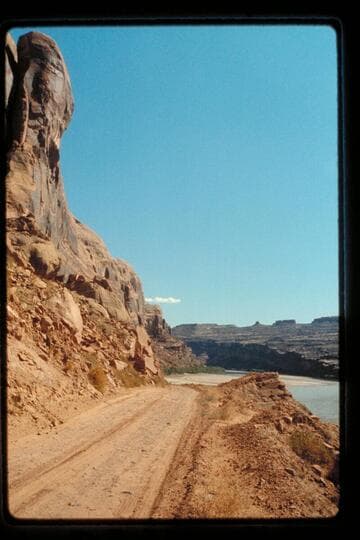 Road down right bank below Moab at Turtle Head Rock