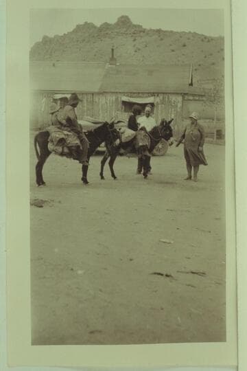 Mr. Flake talks with Indians on the move.  Between Grand Canyon and Navajo Bridge at the time of the Bridge dedication.  Freeman photo