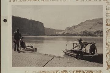 The 18-ft. launch and the skiff "W. H. Bradley" at shore after the swamping of the Stanton skiff on Aug. 21, 1910, about 10 miles up from Wright Bar.  From negative in Waller collection