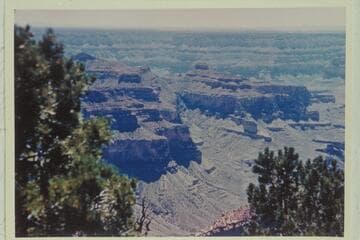 Osiris and Ra from Dragon Head.  Osiris was climbed to near its top by Kane, Hislop,and Stanton in 1890, Feb., after Stanton's row with McDonald.  They were on the top of the Redwall