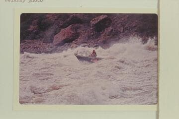 The "Triangle" in Vulcan Rapid demonstrating the remarkable stability of the Turbocraft as Jim Bechtel drives it out of the rough water.  Bob Valentine is riding