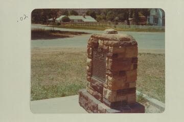 Monument in Kanab marking the north end of the Powell baseline [photo reverse:  Note--stone atop monument was originally in middle of street]