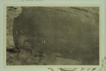 Glyphs on boulder at Mile 22 3/4 in Stillwater Canyon