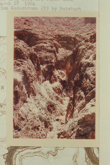 In the Redwall in side canyon at Mile 148.5.  The drop-offs are below this