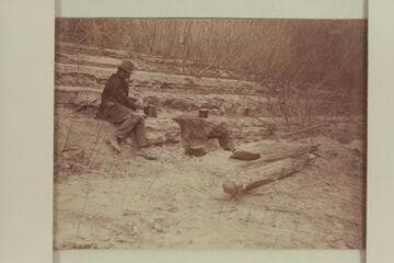 Camp during boat trip from Greenriver, Utah, to the Junction and return.  Probably Arthur G. McCormick in the photo