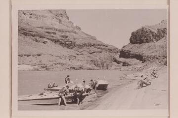 Beached for repairs just above Granite Narrows.  John Schulz and Brian Rowlands are seated at right