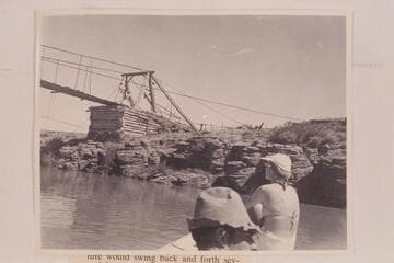 Old suspension bridge in Brown's Park, Mile 259.9, viewed by Shirley Marston in June 1947 when cruising with the Nevills party