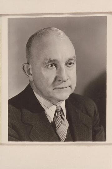 Clyde Langston Eddy registers his "reluctant smile"