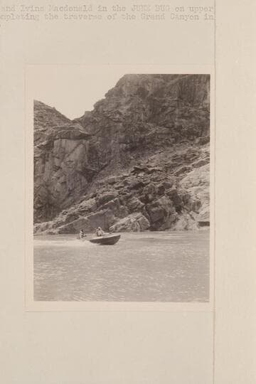 Jimmy Jordan and Ivins Macdonald in the "June Bug" on upper Lake Mead after completing the traverse of the Grand Canyon