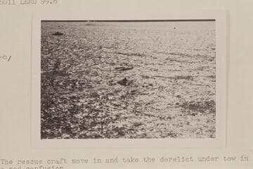 The "Gale V" after flipping on Lake Mead in the Gold Cup Races.  A second hydro stands by