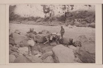 Portage at Lava Falls.  Left to right:  Margaret Marston; Garth Marston; Frost; Riffey; Nevills