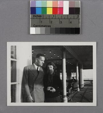 Edwin Powell Hubble and Grace Burke Hubble standing on the deck of the S.S. Statendam, on their way to England, 1936