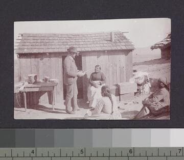 Unidentified man with natives