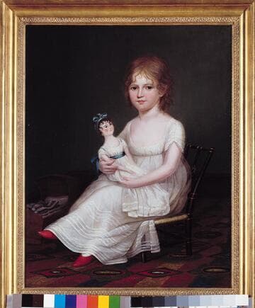 A Girl Holding a Doll