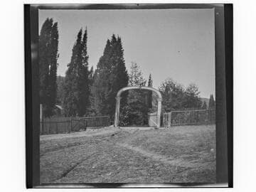 Unidentified gated entry and fence