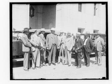 Sheriff Traeger and group of men with guns