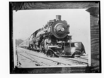 Locomotive 4358 and wrecked car on tracks