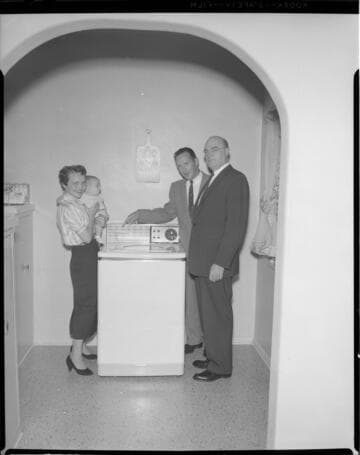 New washing machine in a residential kitchen