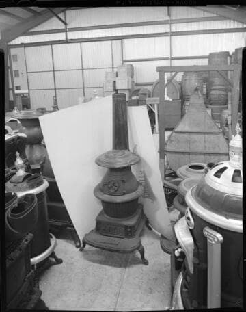 Antique wood-burning stoves and 4 people doing yoga