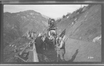 A construction crew cementing a ditch at Kaweah #3 Hydro Plant