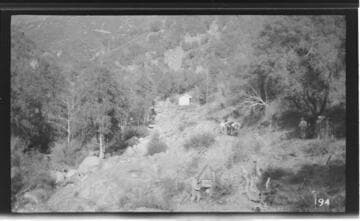 A construction crew surveys the site of the Marble Fork headworks at Kaweah #3 Hydro Plant