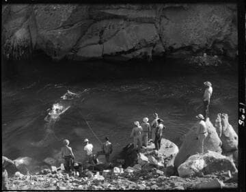 Big Creek 4 construction work:  Men diving in San Joaquin River trying to find submerged truck