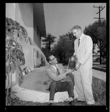 Gold Medallion Home award presentation and women cooking on outdoor electric grills