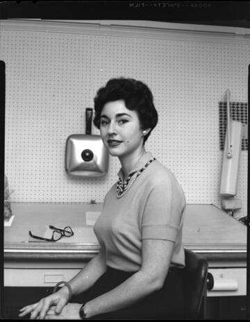 Young lady at drafting desk