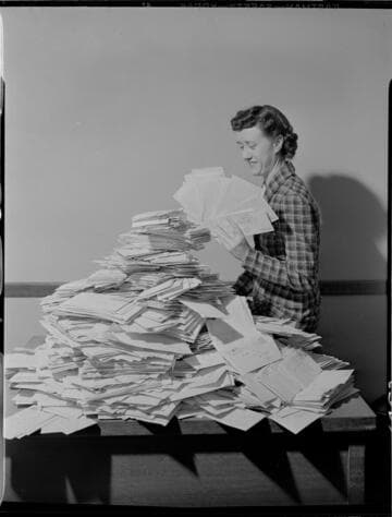 Envelope stack of "What I See Behind My Electric Bill" contest replies and Lillian Presnell