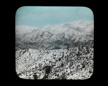 Balloon party looking for trail out of the mountains